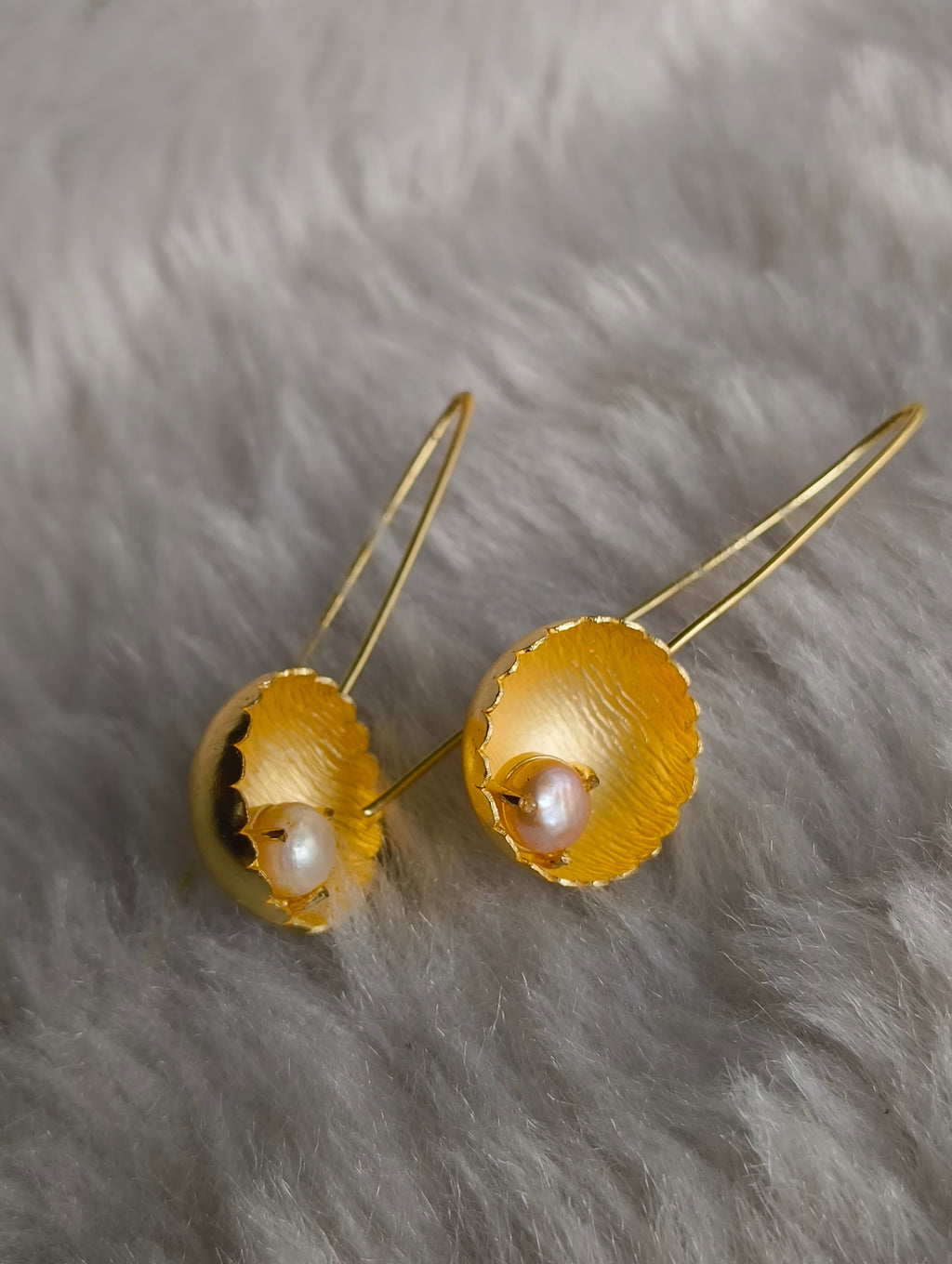 Pearl in Brass