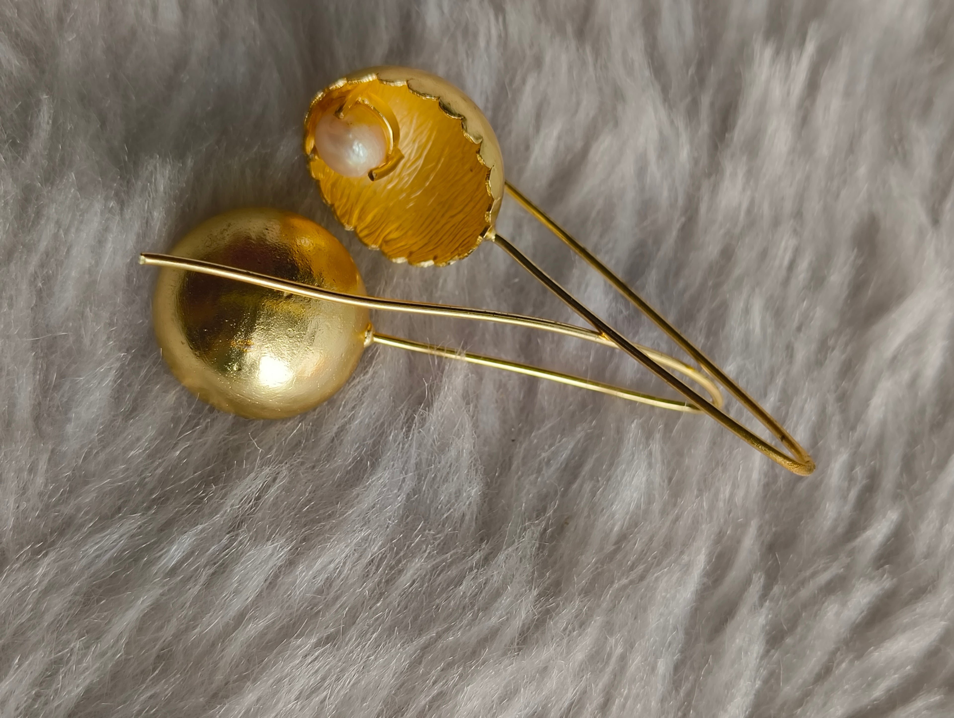 Pearl in Brass