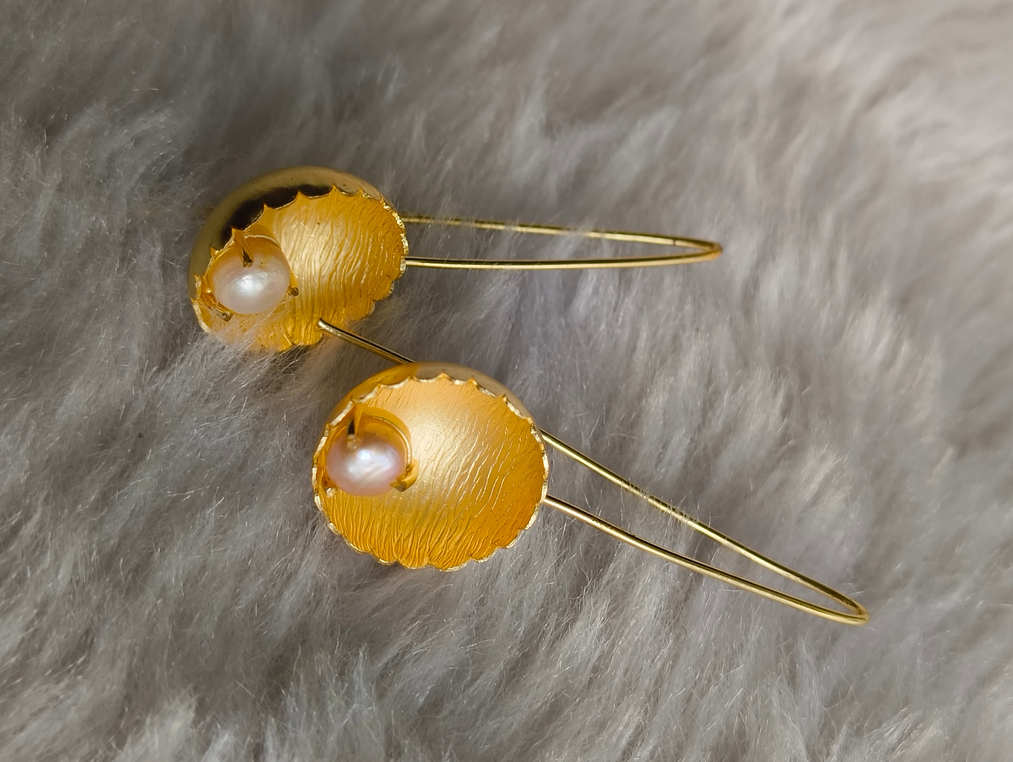 Pearl in Brass